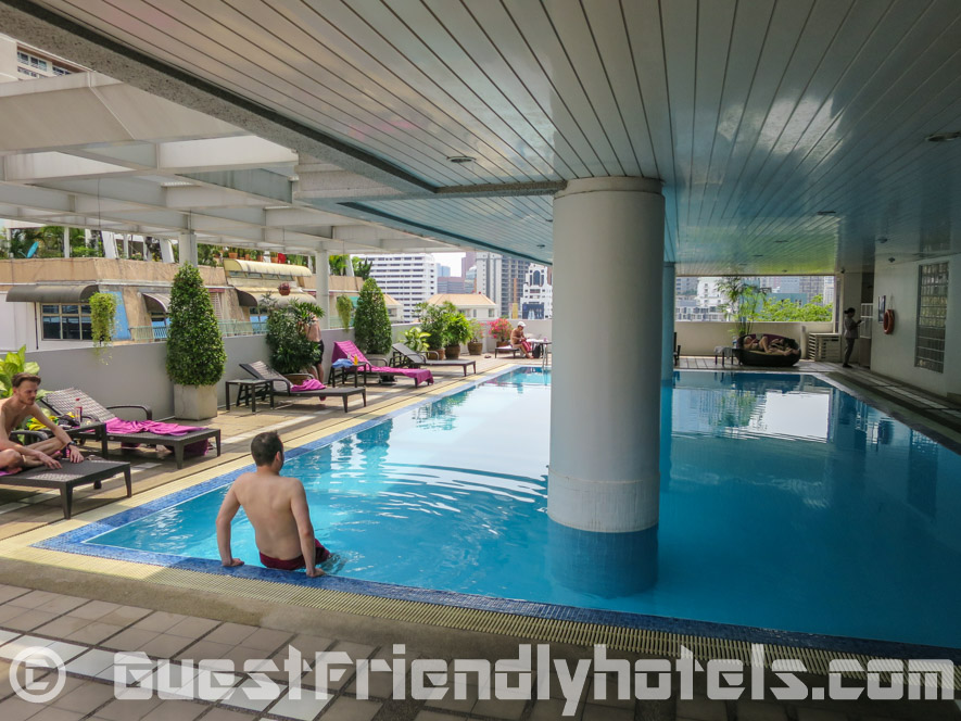 Outdoor swimming Pool area in Phachara Suites