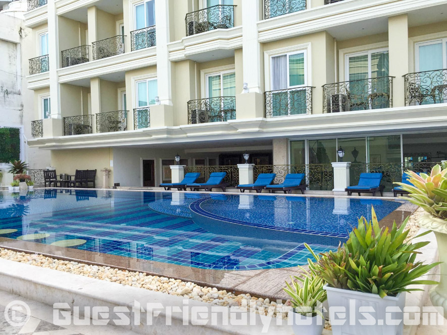 Swimming pool facing the ocean is found on the 3rd floor and has lots lots of beds and umbrellas