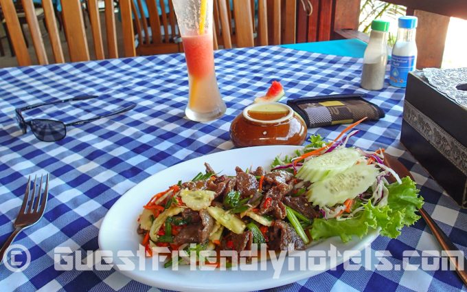 Enjoying myself a Spicy beef salad in Bill Resort restaurant